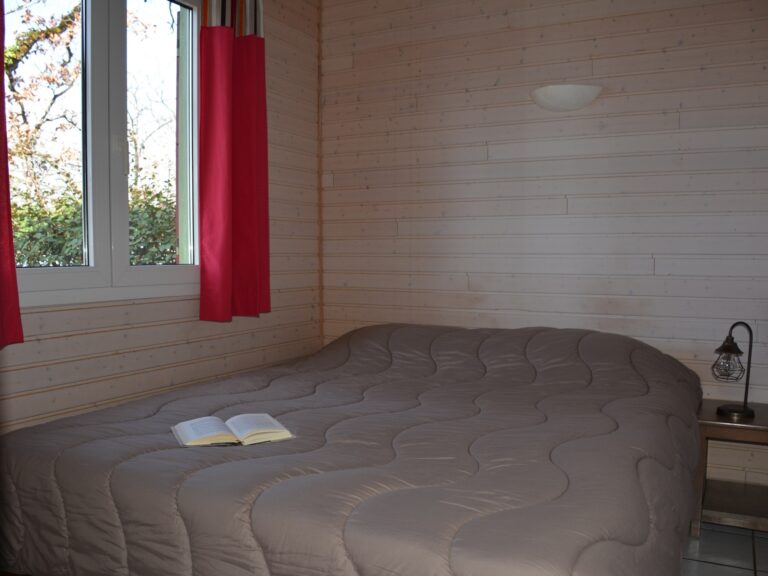 Chambre parentale d'un chalet famille